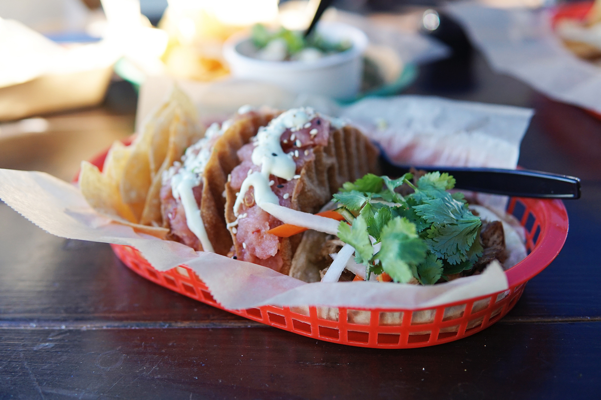 Get the poke taco at East Beach Tacos, you won't be sorry.