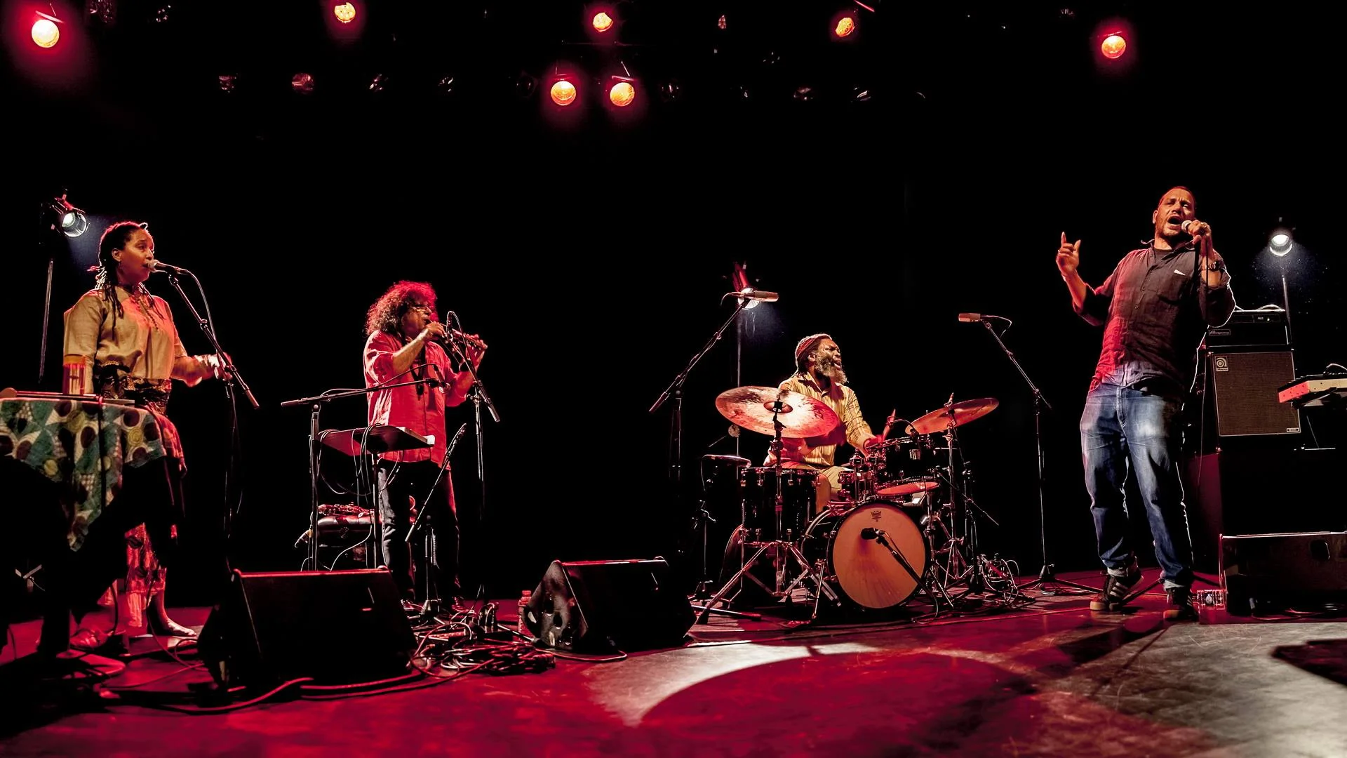 Co-Prosperity Sphere welcomes The Bridge - a transatlantic network for creative music on Sunday, November 12! •• Sunday, November 12 • 8PM-11PM $10 This iteration features Mike Ladd with improvised poetry/lyrics and EMS synth, Mankwe M N Ndosi with voice, poetry, story, texture, Sylvain Kassap on clarinets, and Dana Hall on drums. Like all the ramifications of musicians put forward by the exchange and alliance network The Bridge, this ninth formation is a story about (re-)putting into play, and (re-)putting in common, of parties involved, sparked off by desire, by good pleasure, and a few initial branchings. For several years, and after experiencing all the history of contemporary jazz in France and in Europe, Sylvain Kassap has been collecting meetings with Chicago musicians, in a duo with Hamid Drake, or for a multiple-input project with Nicole Mitchell, or along Edward Wilkerson Jr. during a thundering visit in Illinois in June 2013. This conjugation of stories and adventures in the present tense, decidedly and resolutely, seeks to set off, under the lights of the clarinet, the meeting between the transcultural singing of Mankwe Ndosi who, between Tanzania and Midwest, soul and free, works and is worked from within by different vocal and verbal traditions, to forge her own, necessarily hybrid; and the chanted, hammered or sung speech, the spoken flow of Mike Ladd, who’s got as many vocal chords to his bow than the multiple meanings that can be found in spoken word, slam, and rap when they’re in direct connection with high level poetry. An inaugural confrontation took place in Montreuil, in October 2014, in anticipation being joined by Dana Hall, ubiquitious drummer and music teacher at DePaul University, who names among his sources of inspiration and improvisation John Carter as much as Jimmy Giuffre, Andrew Hill as much as Richard Wright, the African Diaspora as much as the Second School of Vienna, the AACM and the plurality of worlds… That is to say he’s the most formidable organizer of rhythms and relations, the man of the situation. In October 2015, they turned everything inside out on their path in France. In November 2017, they will be straight down to brass tacks in Chicago. Lineup: Mike Ladd – improvised poetry/lyrics, EMS synth Mankwe M N Ndosi – voice, poetry, story, texture Sylvain Kassap – clarinets Dana Hall – drums Photos - courtesy of "Rémi Angeli"