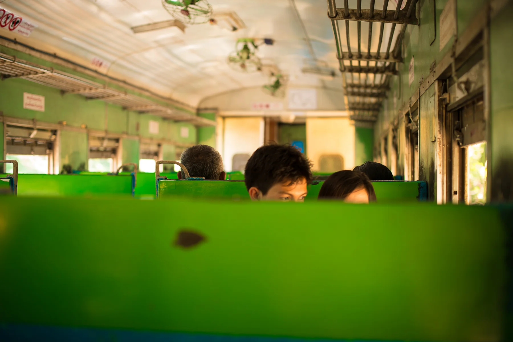 Couple on circle train. Yangon, Myanmar