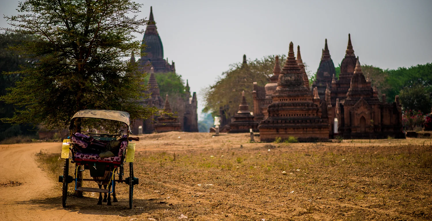 Temples and Horse Drawn Carriage at Bagan. Bagan, Myanmar