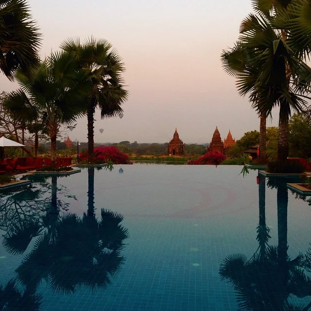 Hot air balloons over temples. Aureum Palace Hotel. Bagan, Myanmar