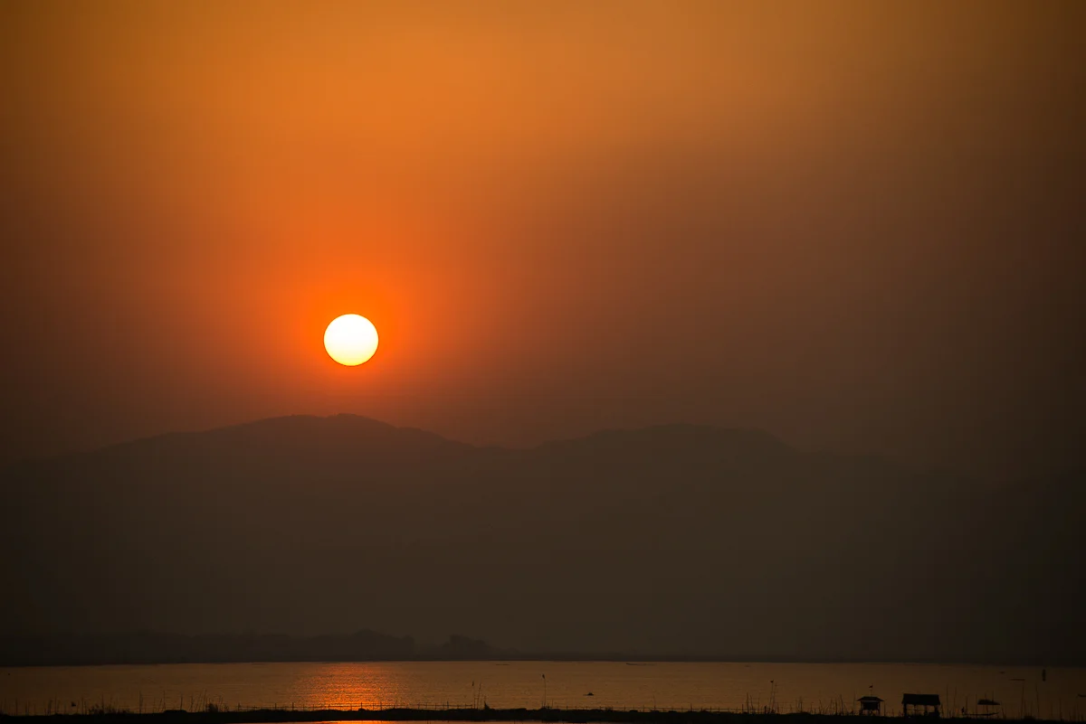 Sunset over Inle Lake, view from my hotel room. Inle Lake, Myanmar