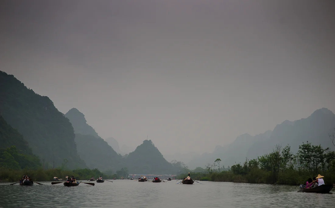 Heading down river to the Perfume Pagoda. Hanoi, Vietnam