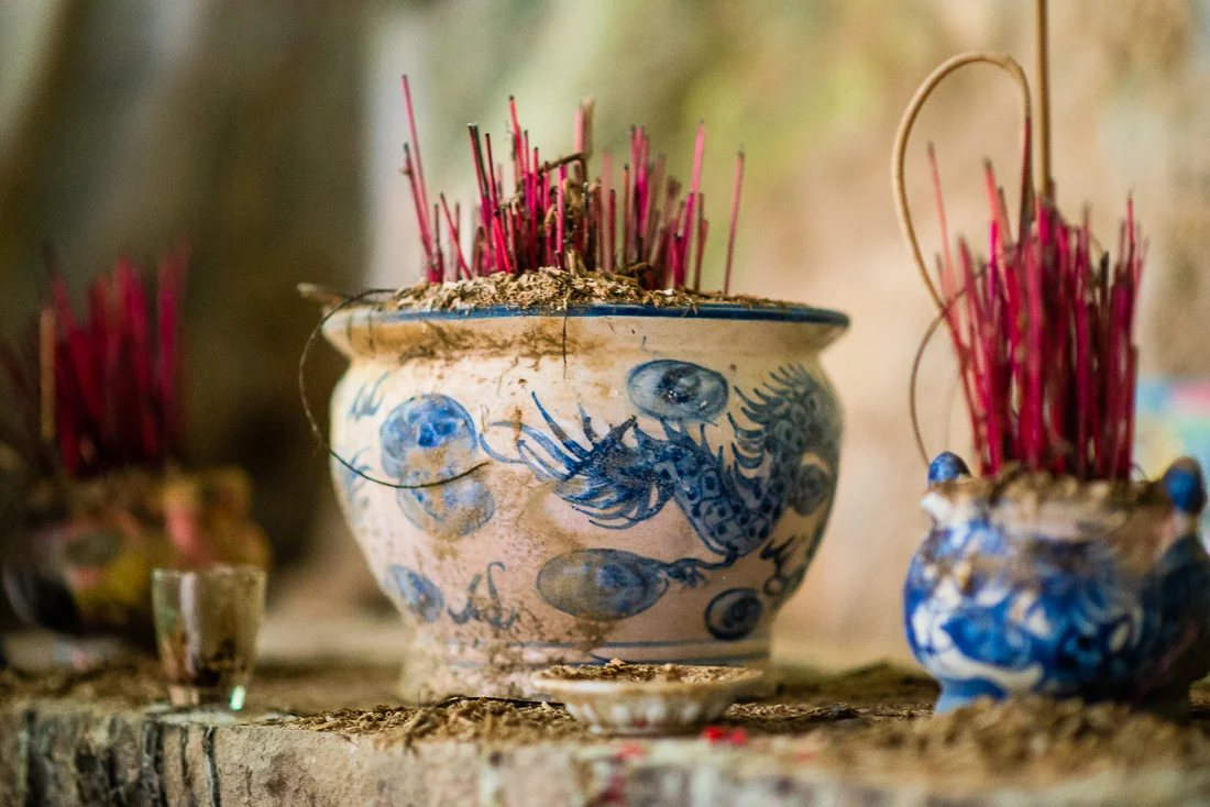 Incense in a cave on Marble Mountain. Hoi An, Vietnam