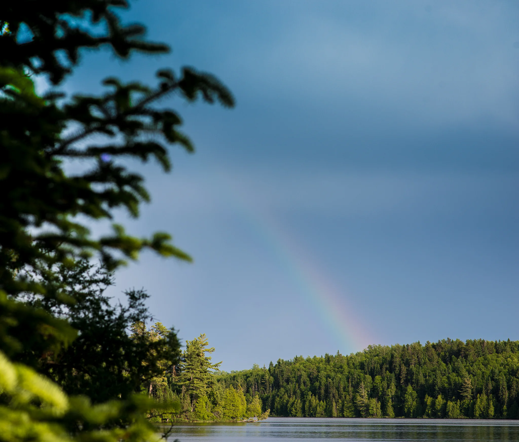 Rainbow after the storm on Long Island Lake
