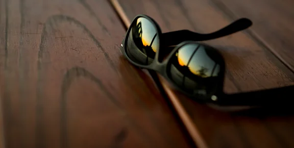 Sunset and my ride reflected in my sunglasses.