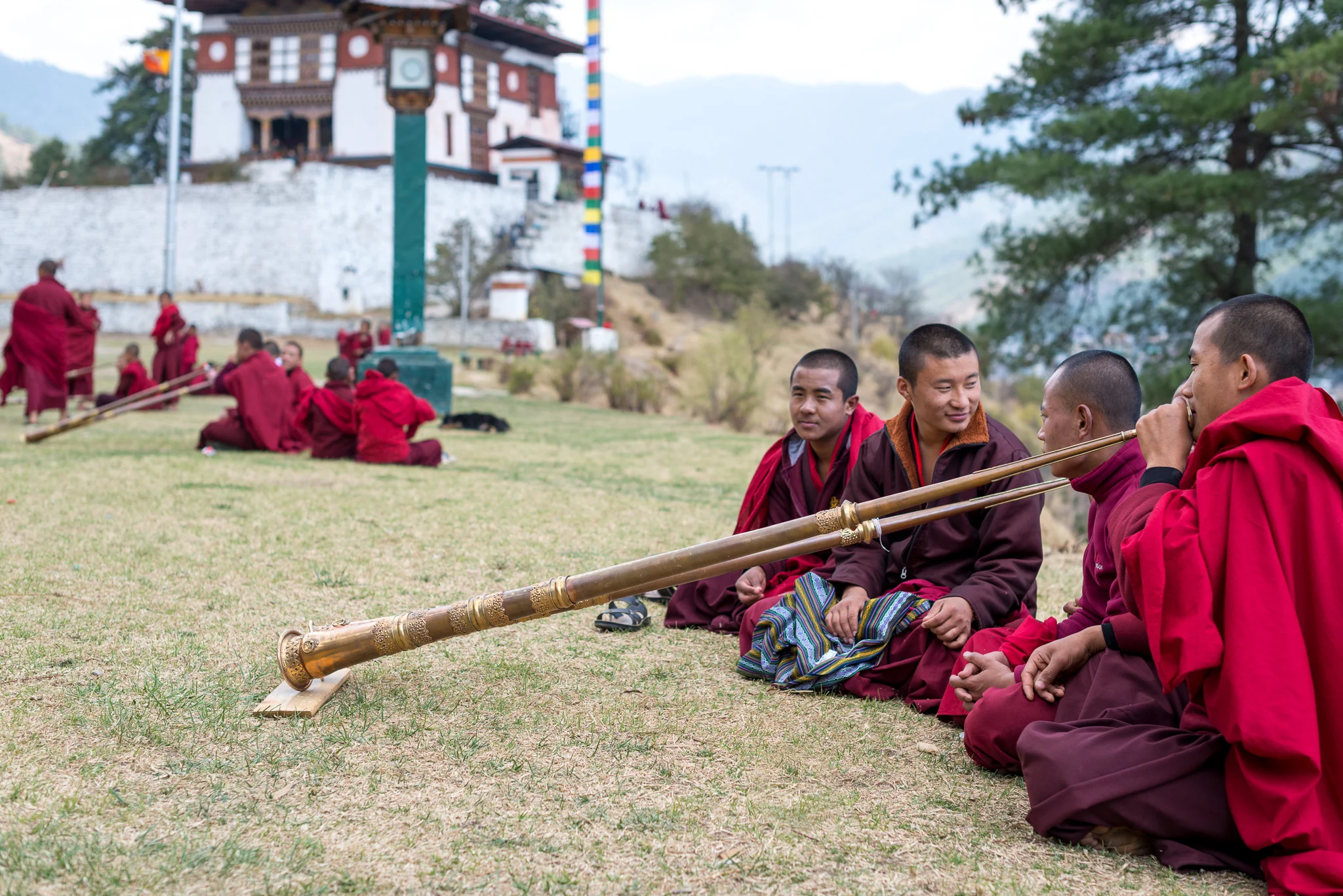 Monks practicing horns