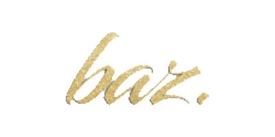 Gold-colored handwritten text spelling 'baz.'