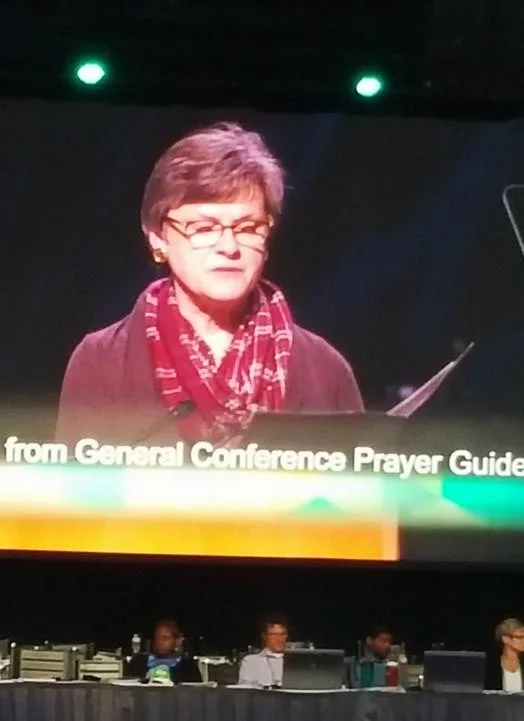 Rev. Dr. Alice Rogers leads the General Conference in closing prayer and meditation on May 17. Photo credit: Sharletta Green