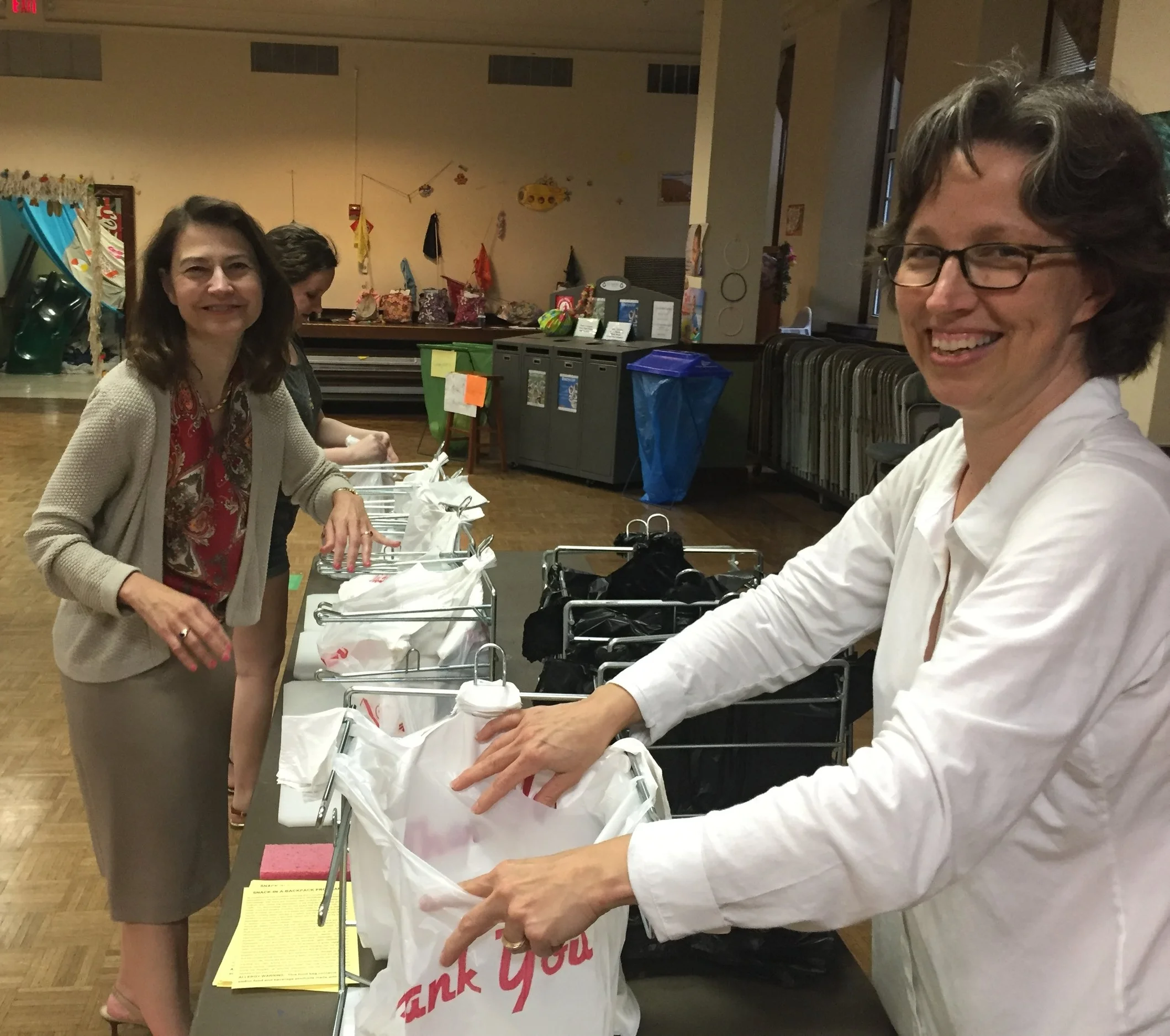 Deborah Marlowe (left) overseeing a Thursday night packing this summer.