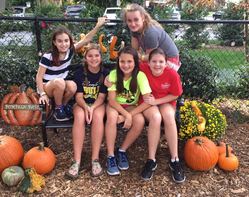 Glenn Youth helping to unload the pumpkins and beautify the patch.