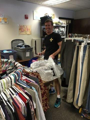 Aaron volunteering at the IRC refugee store.