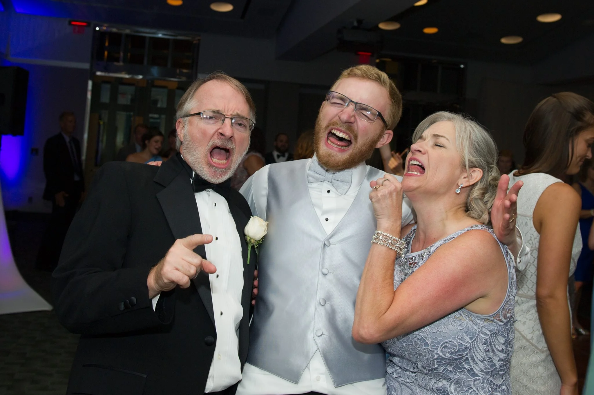 Dancing at his wedding with his parents...to a Journey song?