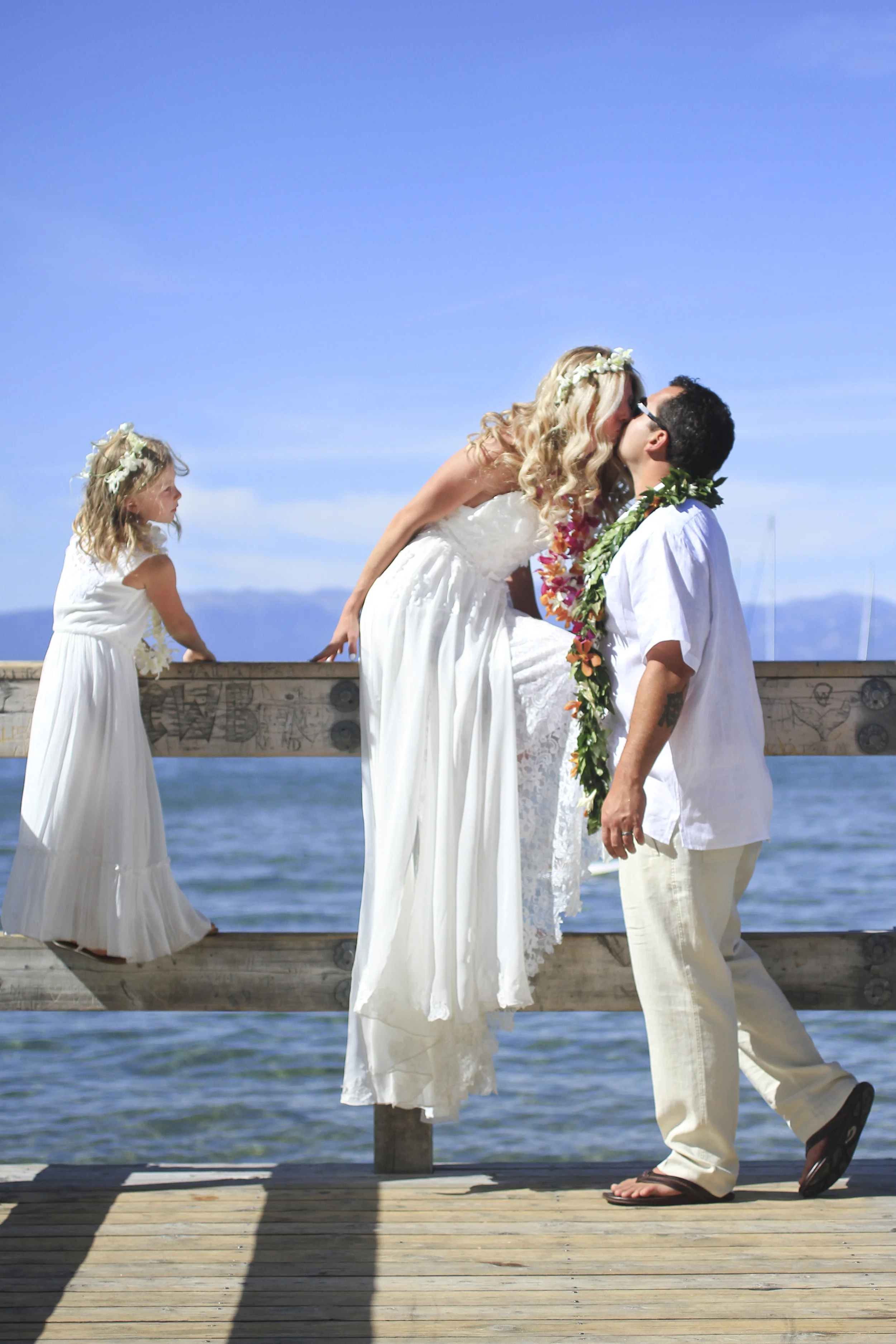lake tahoe, beach, pier, dock, boardwalk, lake, tahoe, ocean, beach, water, gorgeous, view, wedding, lei, flower girl, all white, dress, hawaii, hawaiian, wedding, photographer, photography, photo, photos, romantic, portrait, family photo