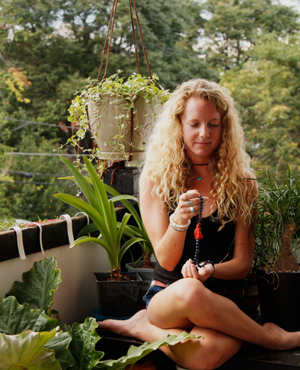 Pictured with the Malasana Mala