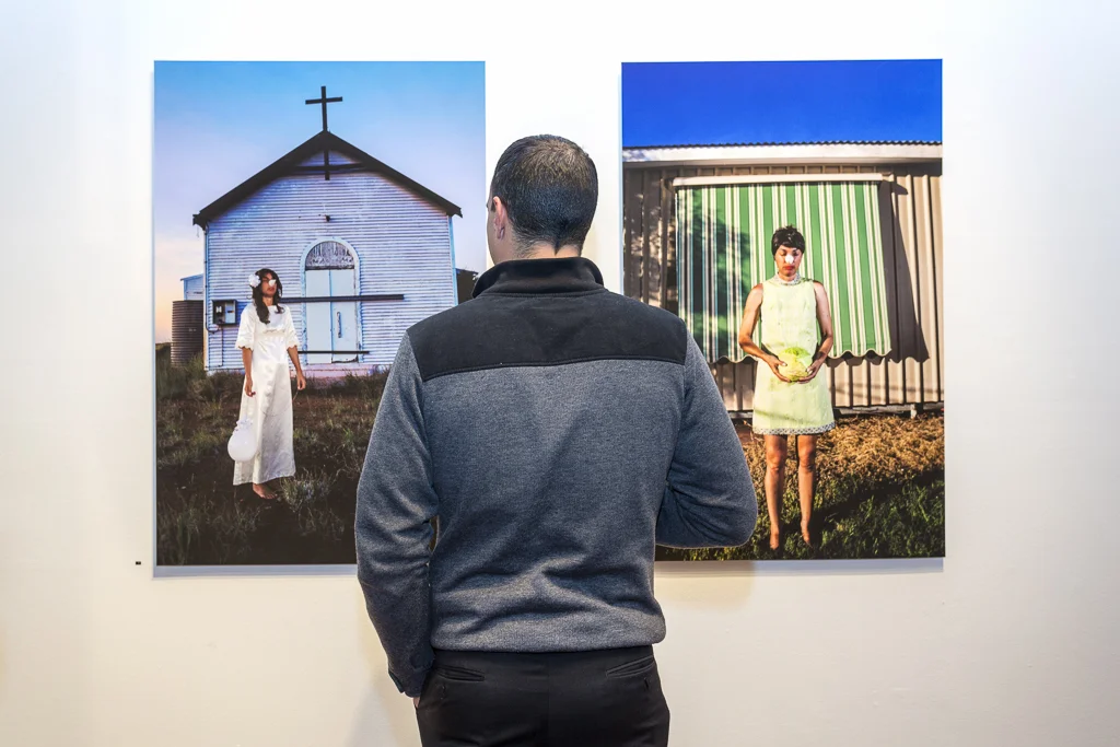 Audience member viewing 'The Bride' and 'Cabbage Wife' by Thea Costantino, 2015