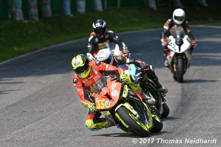 Close racing with David Datzer (#55). Photo by Thomas Neidhardt.