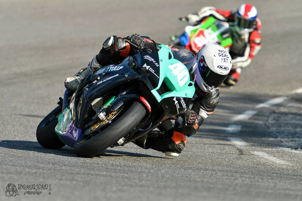 My favourite corner, the lap I passed Jiri Petrla (#27) for 12th. Note the white boot I was able to borrow from Juha Kallio. Photo by Martin Perina.