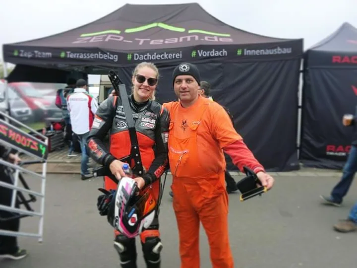With Tomas Bata and his Dutch/orange outfit in the paddock.