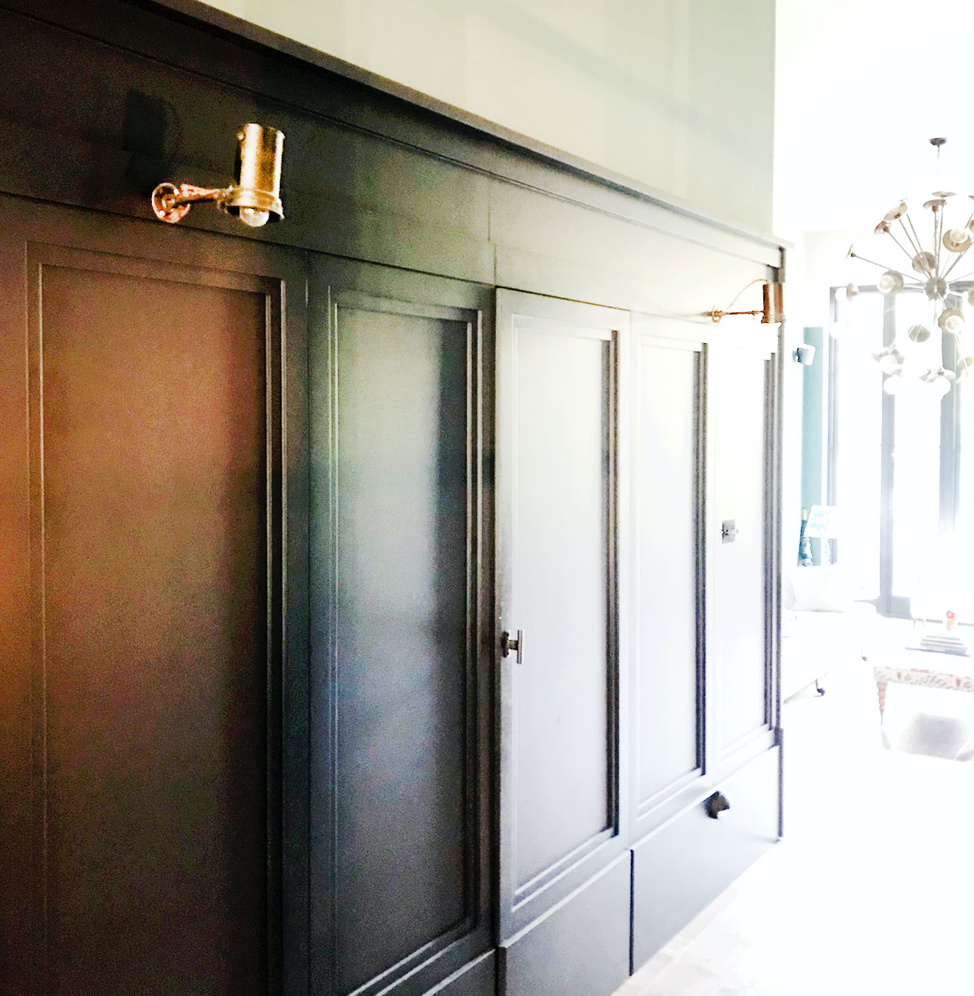 Hall, bespoke panelling was created to conceal jib door to laundry, and to create visual interest