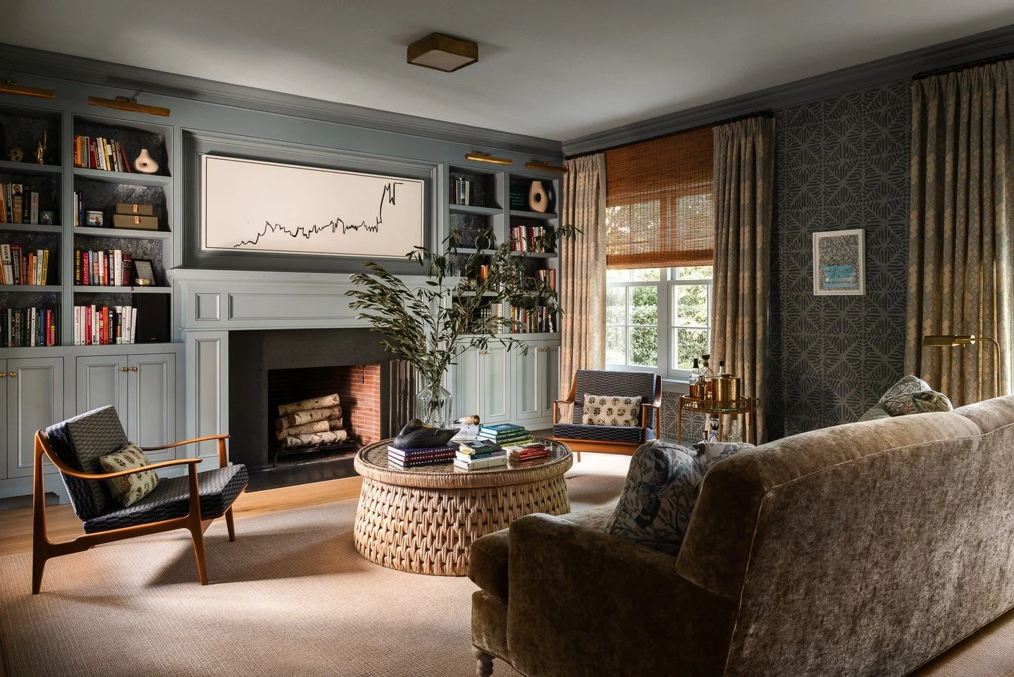 Situated at the front of the home, the library offers a quieter counterpoint to the open family spaces beyond. Custom built-ins and a deep-toned palette lend a sense of intimacy, while natural light softens the room&rsquo;s tailored detailing. Design