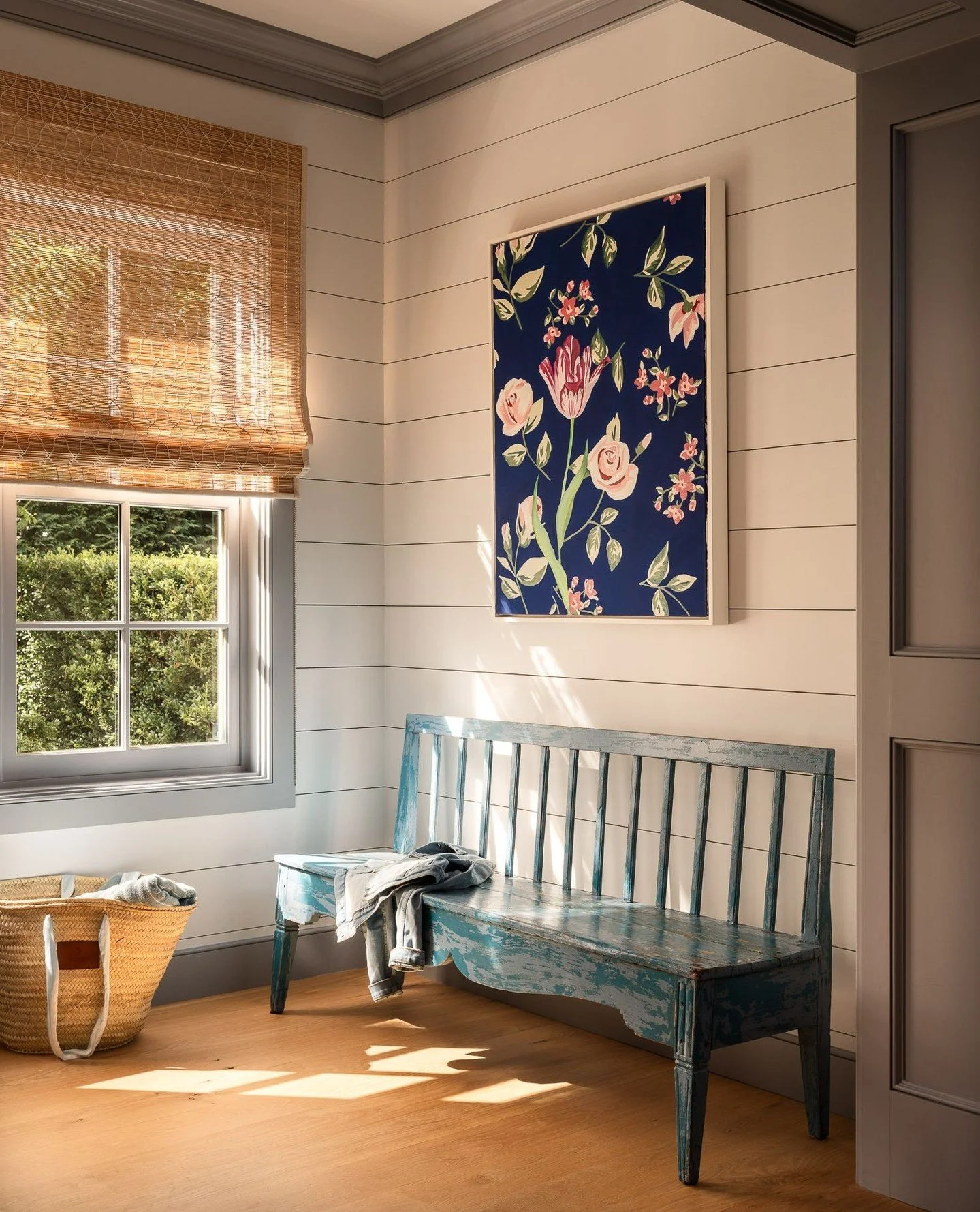 The foyer is both functional and filled with light&mdash;its shiplap walls offering durability with a sense of understated utility. Natural textures, coastal tones, and soft morning light set the tone for the rest of the home, where everyday use meet