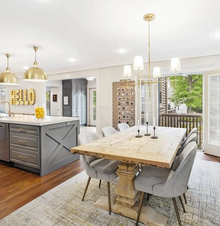 A seamless connection between kitchen and dining, where cabinetry anchors the space and craftsmanship defines the experience.⁠
⁠
Custom-painted millwork frames the island and perimeter cabinetry, detailed with recessed panels, cross-brace accents, an