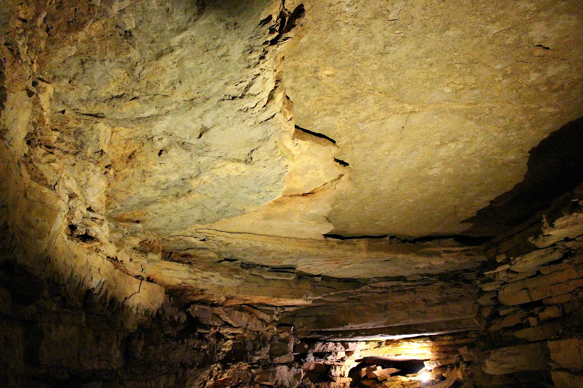 The flat layers of limestone rock.