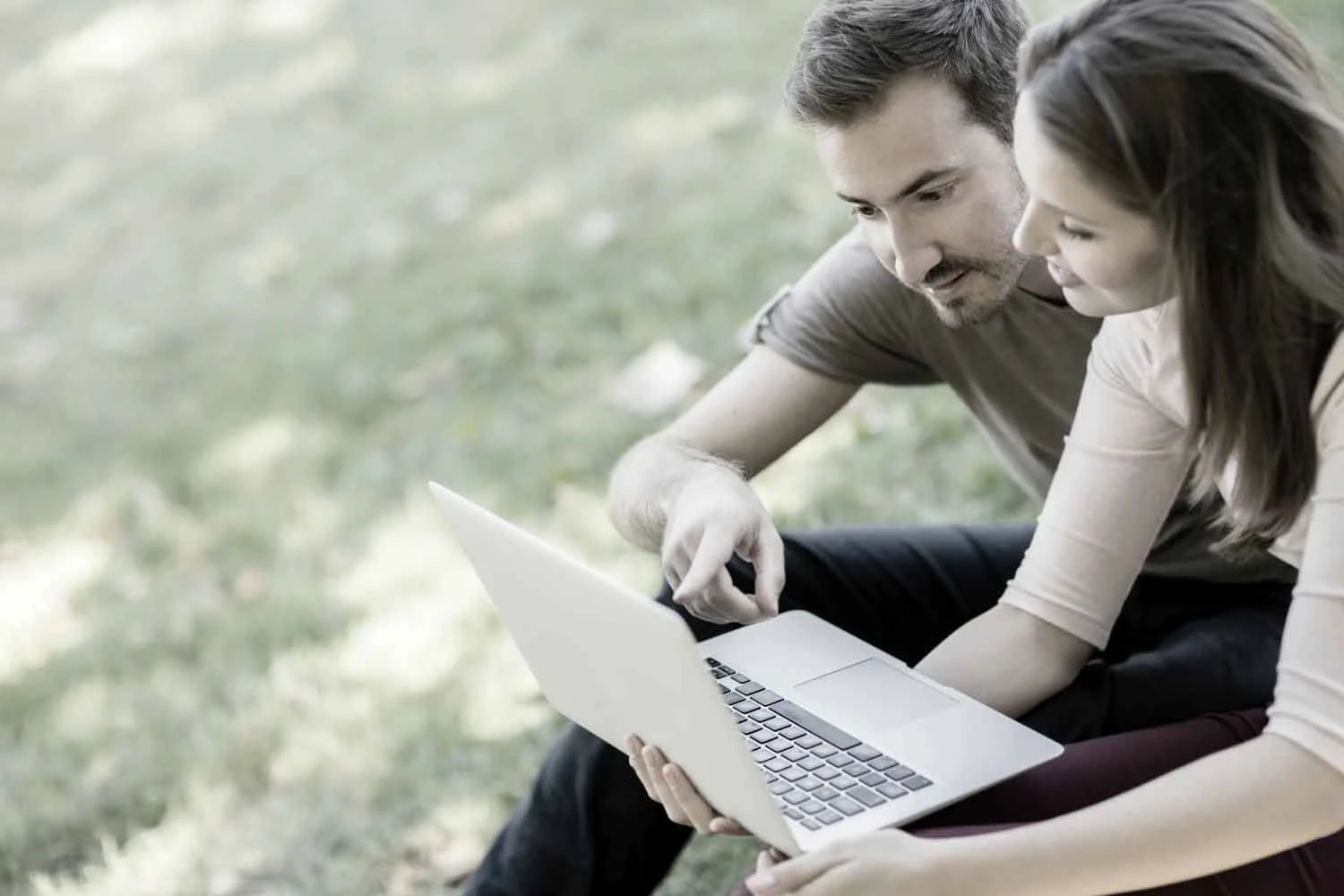 couple-searching-for-a-home-on-the-internet-black-and-white.jpg
