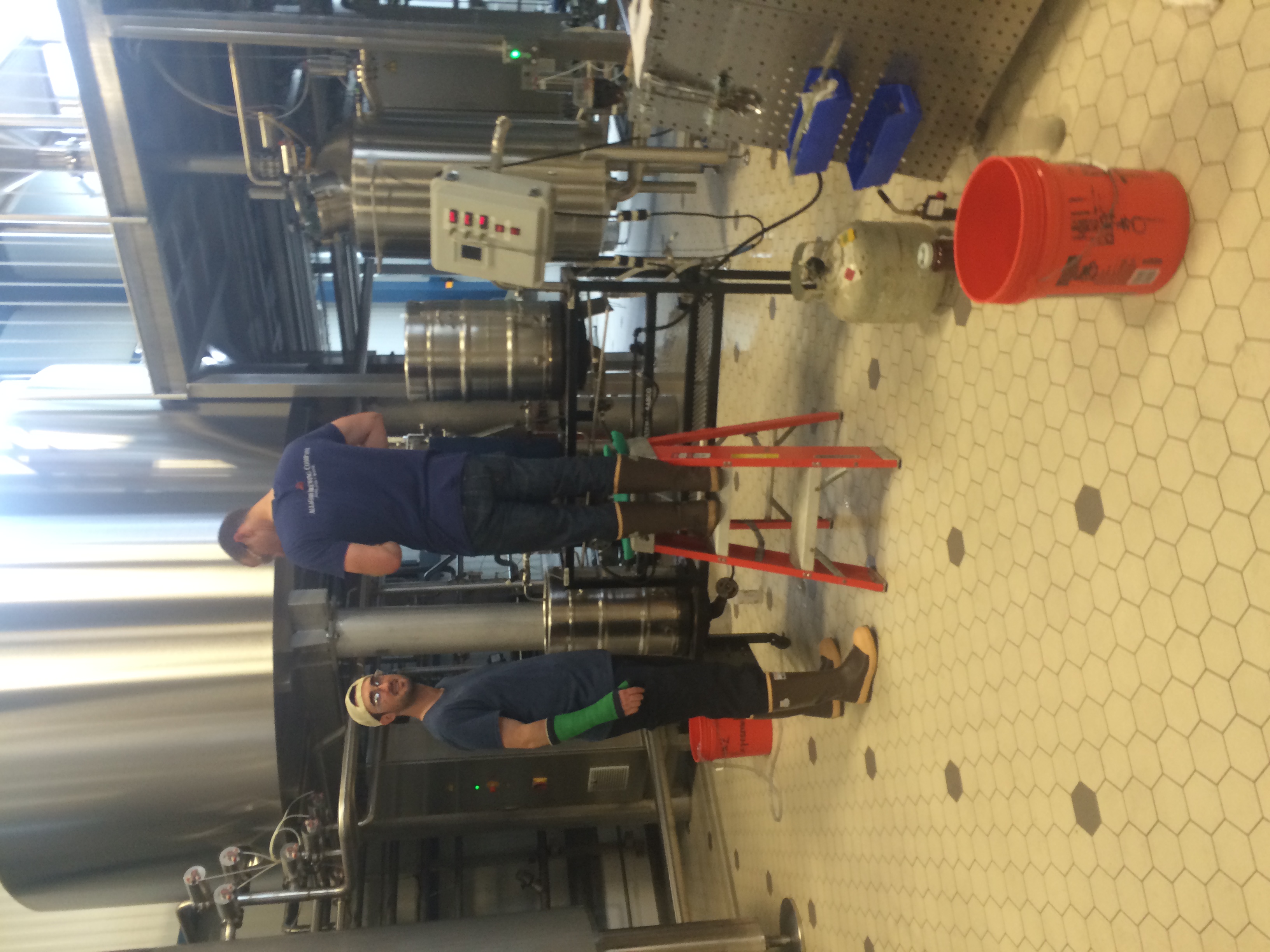 Allagash employees brewing a personal recipe on the pilot system