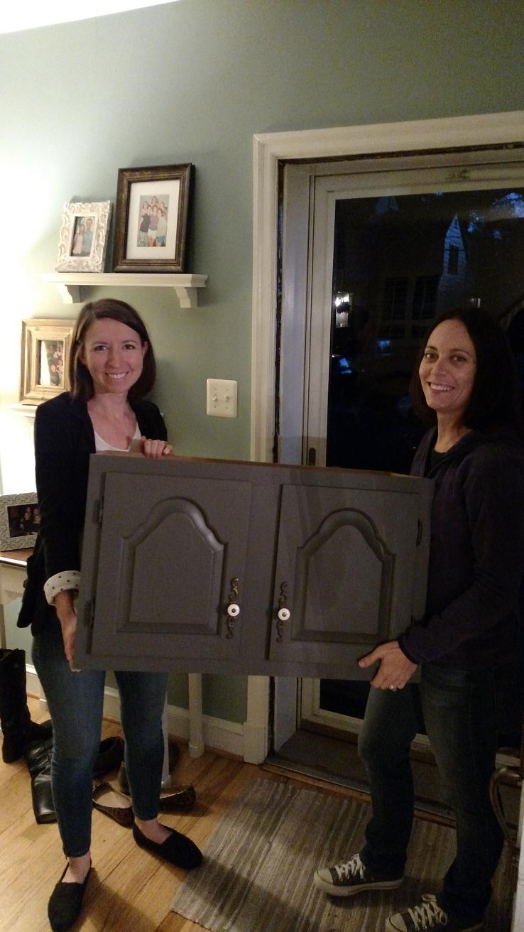 Us with cabinet. Original fixtures. Yes, it's still dark outside.