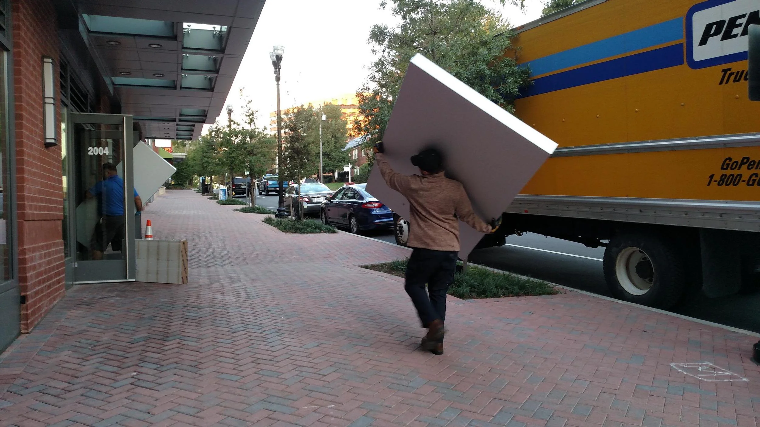 These guys carried the panels in by themselves. At 7am. We were impressed.
