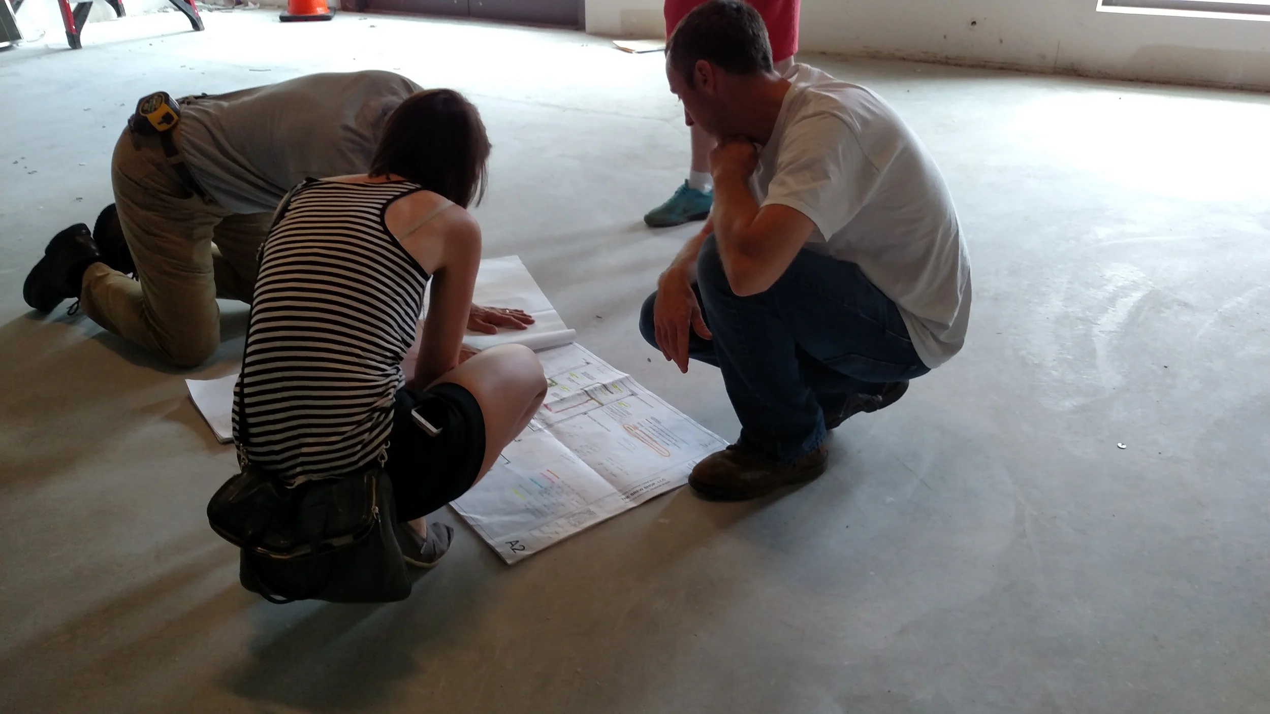 Going over the architectural drawings with our GC and Carpenter