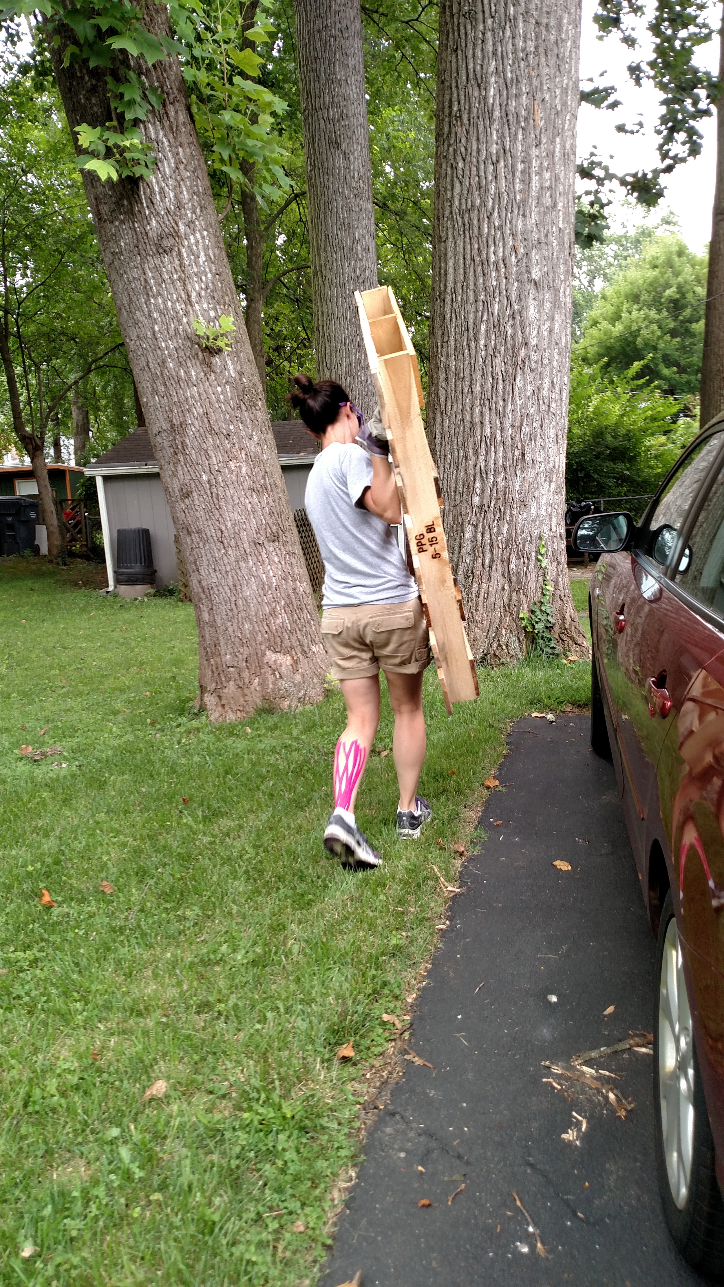 The beginning of the pallet wall project. Hauling the pallets we scavenged.
