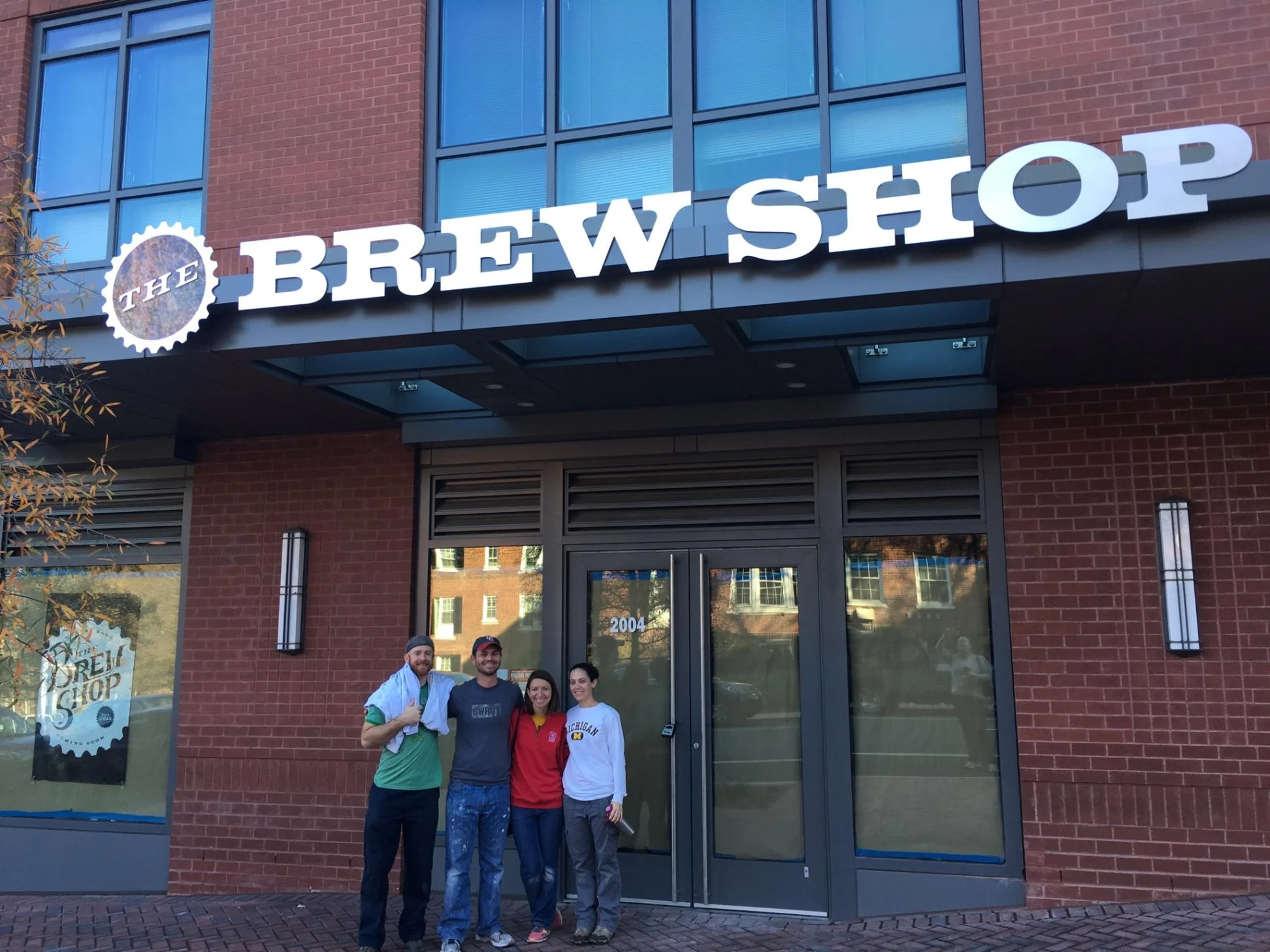 Us with The Brew Husbands after a hard day's work, under our exterior sign