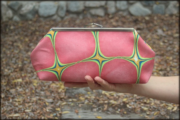 VeronicaClutchSeeingPinkHeld.jpg