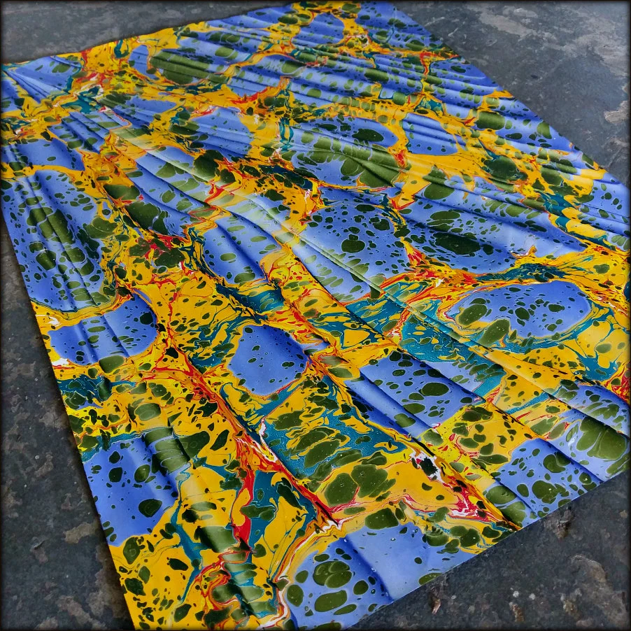 SpanishMarbleBlueYellowGreenFullAngleFramed.jpg
