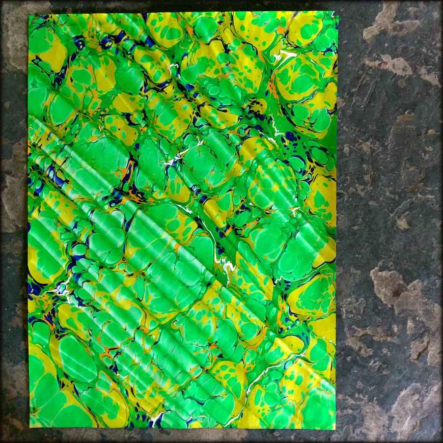SpanishMarbleBrightGreenYellowBlueFullFramed.jpg