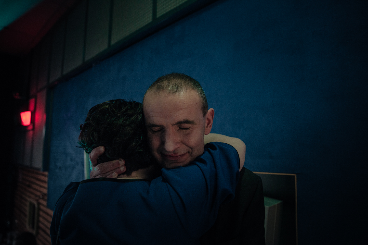 Guðni hugging his wife after the numbers came in confirming that he would be the next president of Iceland
