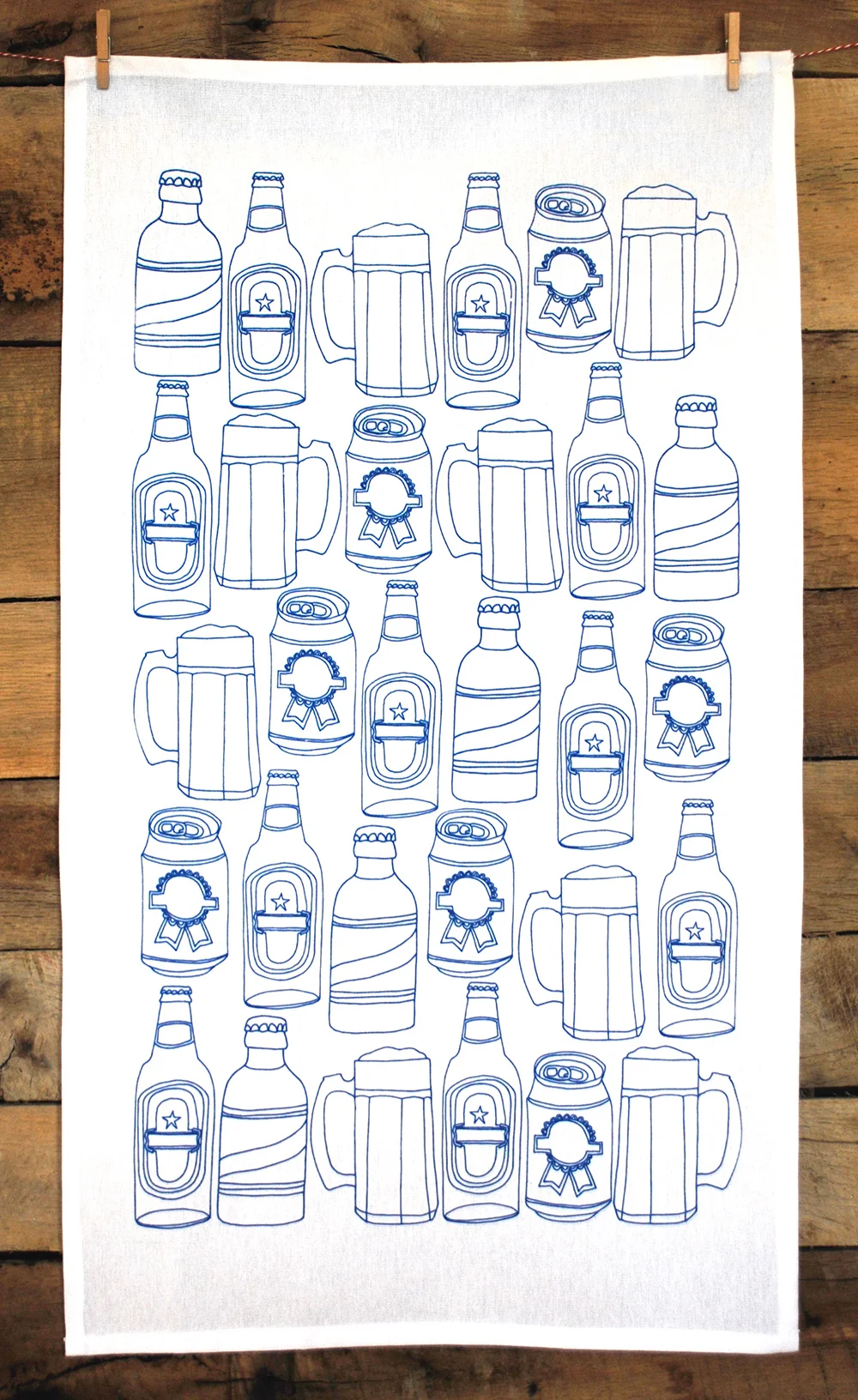 Screen printed tea towel featuring a hand-drawn beer pattern.
