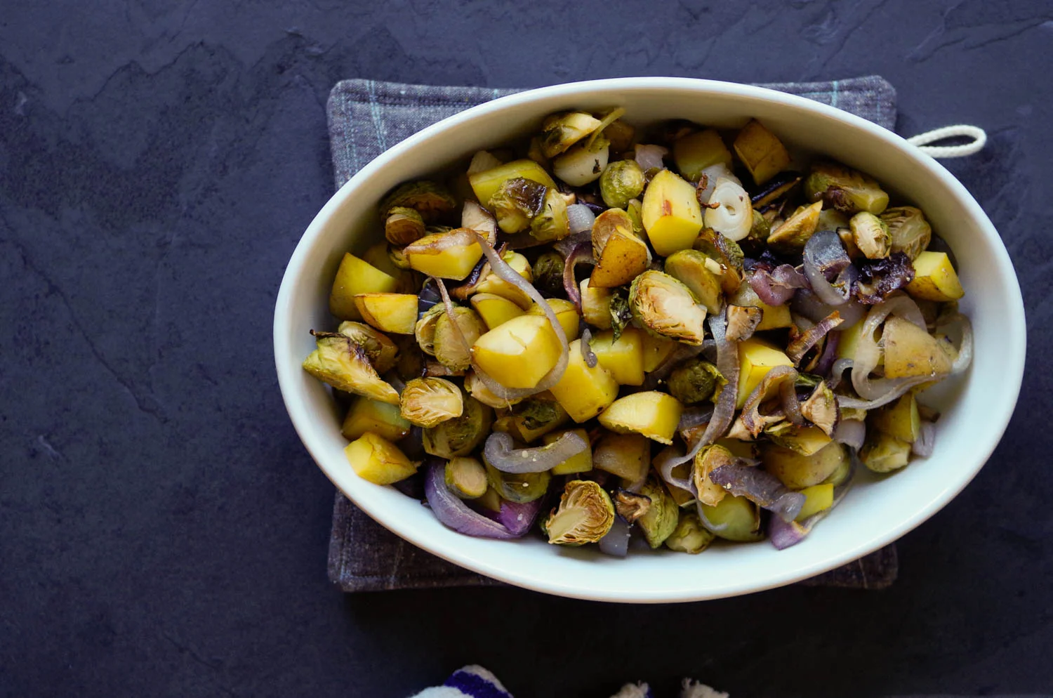 Roasted vegetables are easy to serve during the holidays. Potholder and recipes by Beautiful Ingredient.
