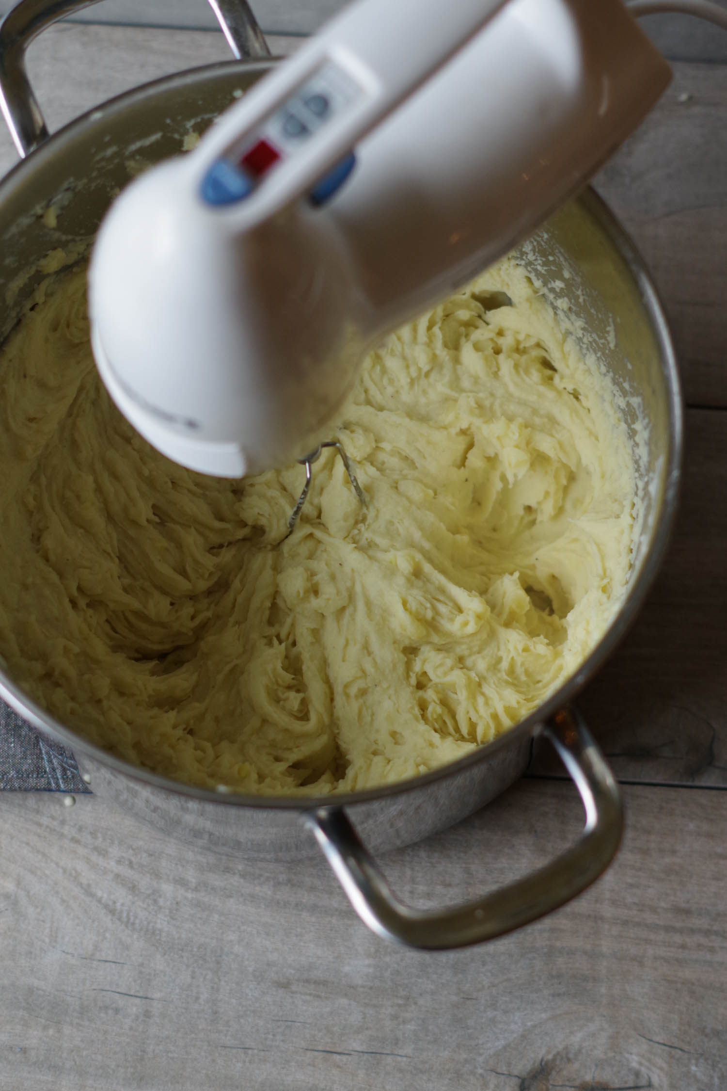 Whipping potatoes for a nice, creamy potato mash.