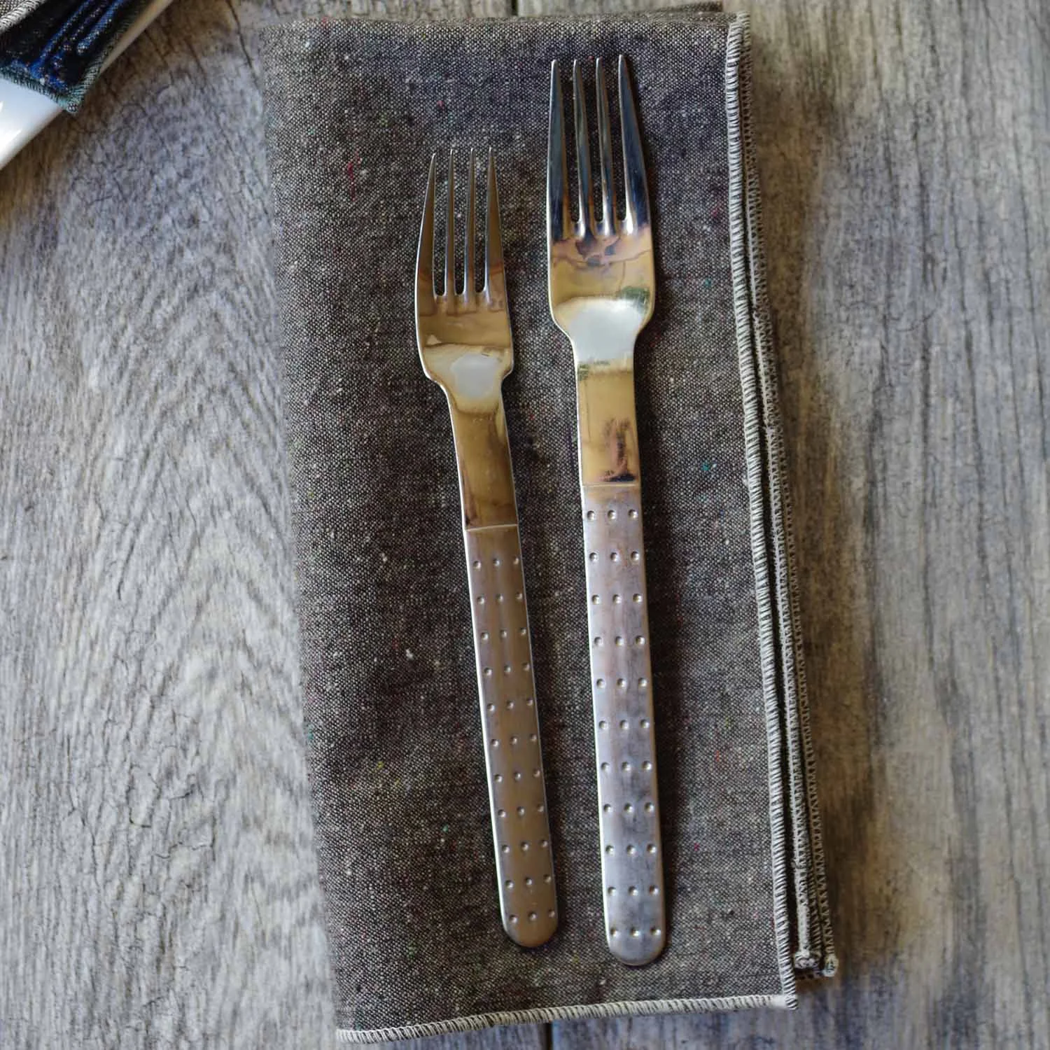 Heathered granite napkins with pearl trim