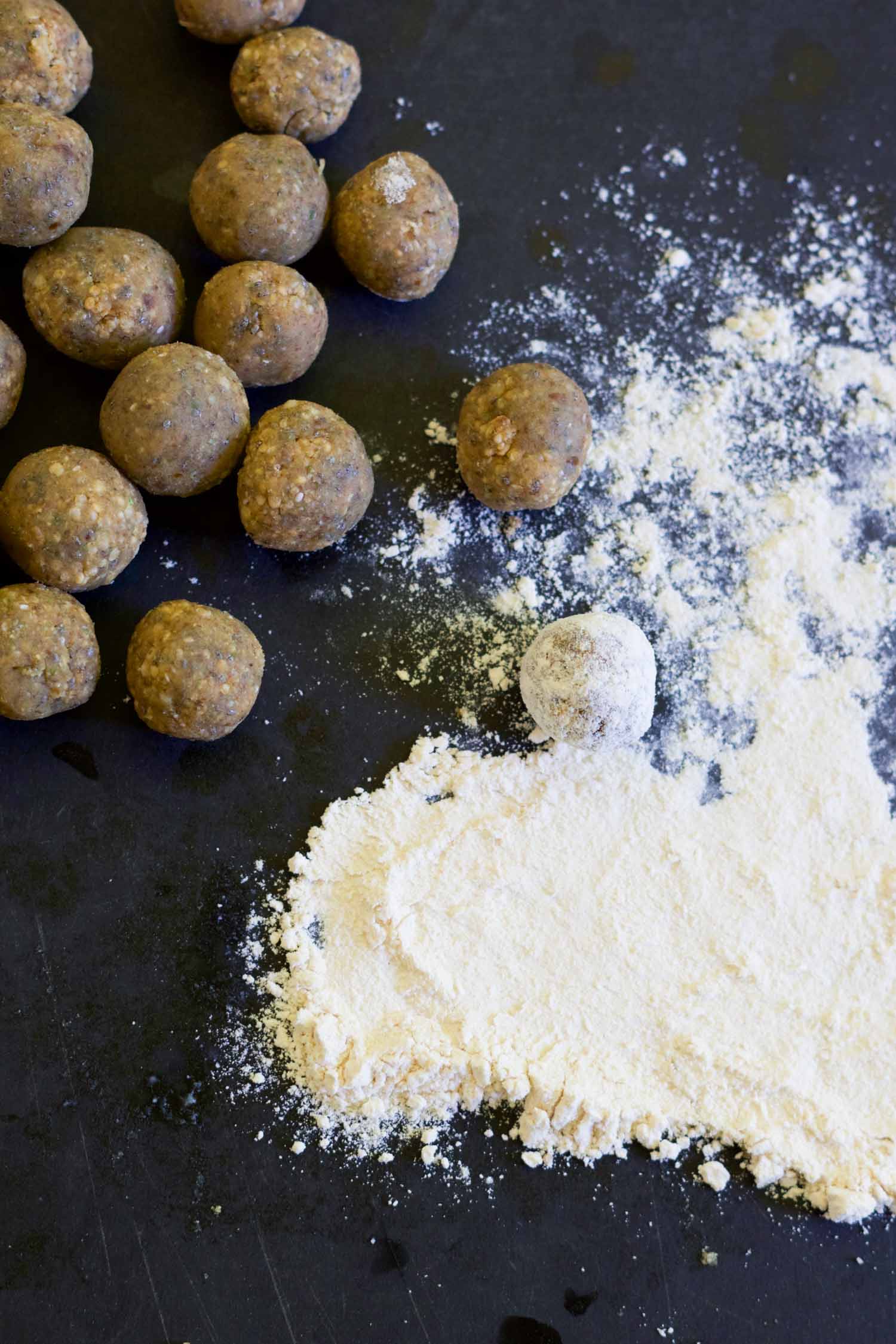 rolling-coconut-lime-energy-balls-in-coconut