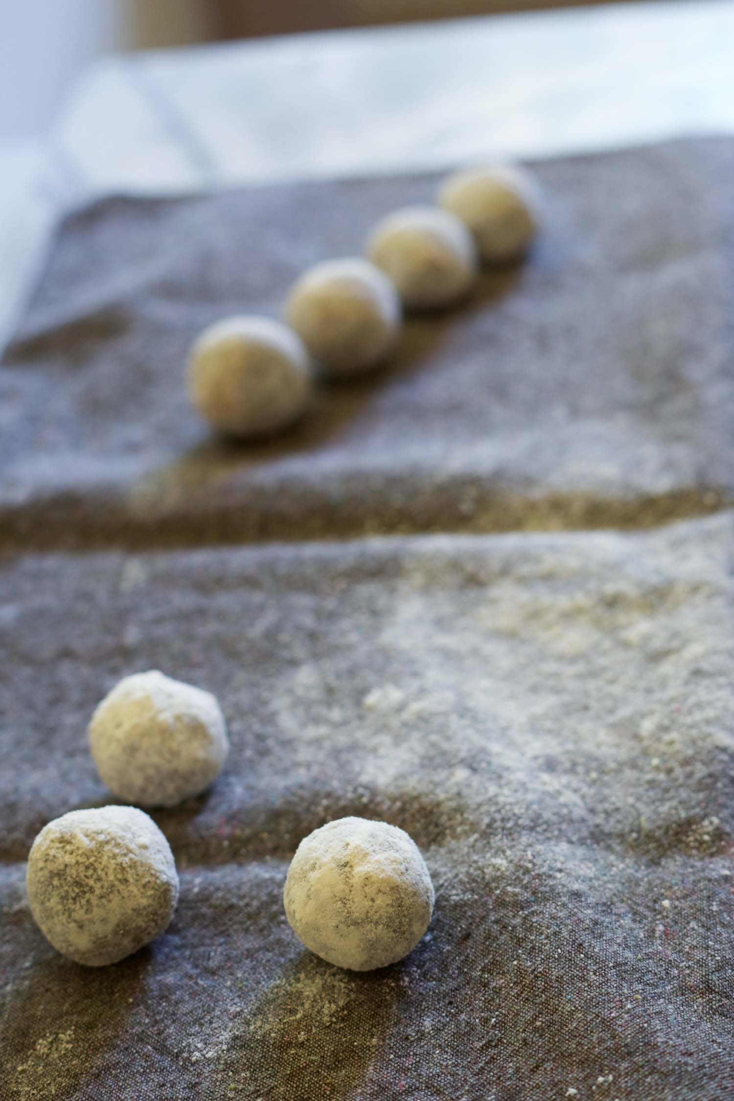 Roll the coconut flour-coated balls on a napkin or towel to create just a thin coat of flour. - 