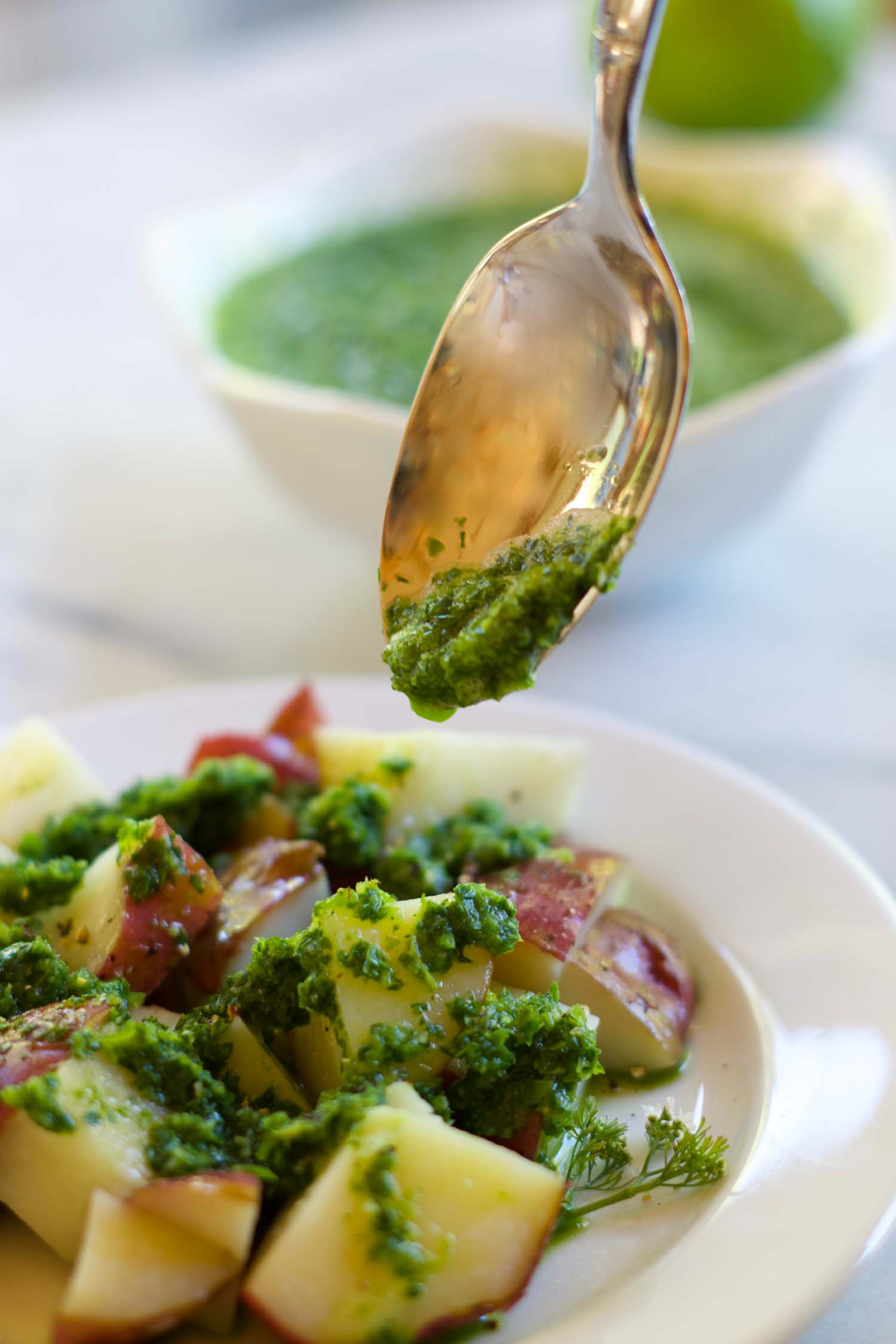 Chimichurri-ish over steamed potatoes, by Beautiful Ingredient