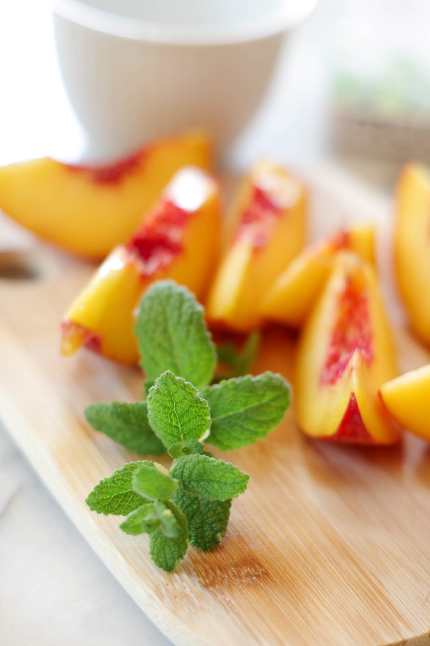 Pineapple Mint and peaches for Frugal Vegan Cookbook's Coconut Peach Popsicles. Photo by Beautiful Ingredient.