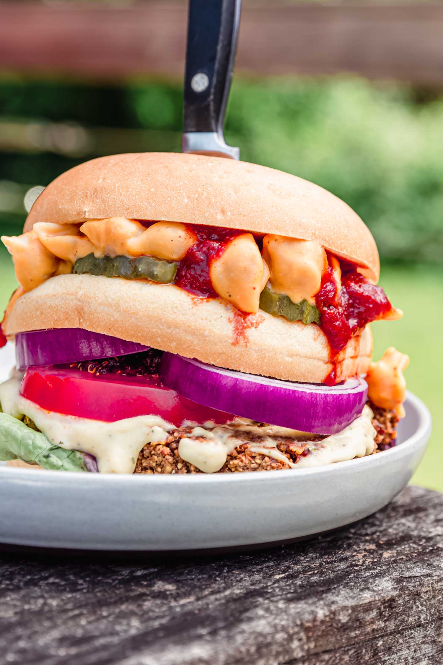 Bacon Mac and Cheese BBQ Blue Burger from  Epic Vegan  by Dustin Harder. Photo by Kari of Beautiful Ingredient. #veganburger #veggieburger #recipe #veggieburgerrecipe #summerrecipe #epicvegan #veganrecipe