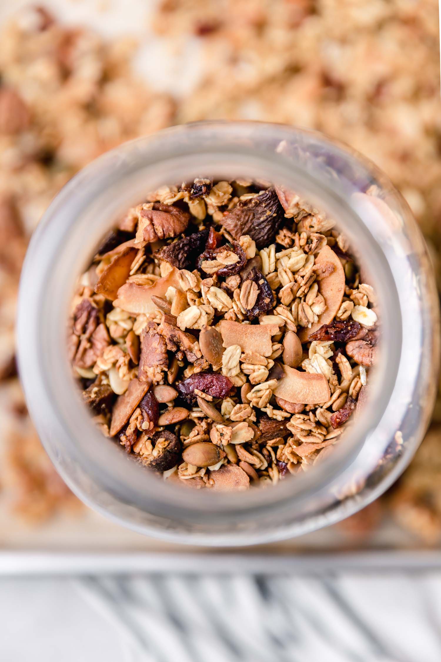 Easy Orange Pecan Power Granola is an easy recipe to make and loaded with goodies. #vegangranola #orangepecan #pecangranola #homemadegranola #recipe #veganrecipe #breakfastrecipe #plantbased