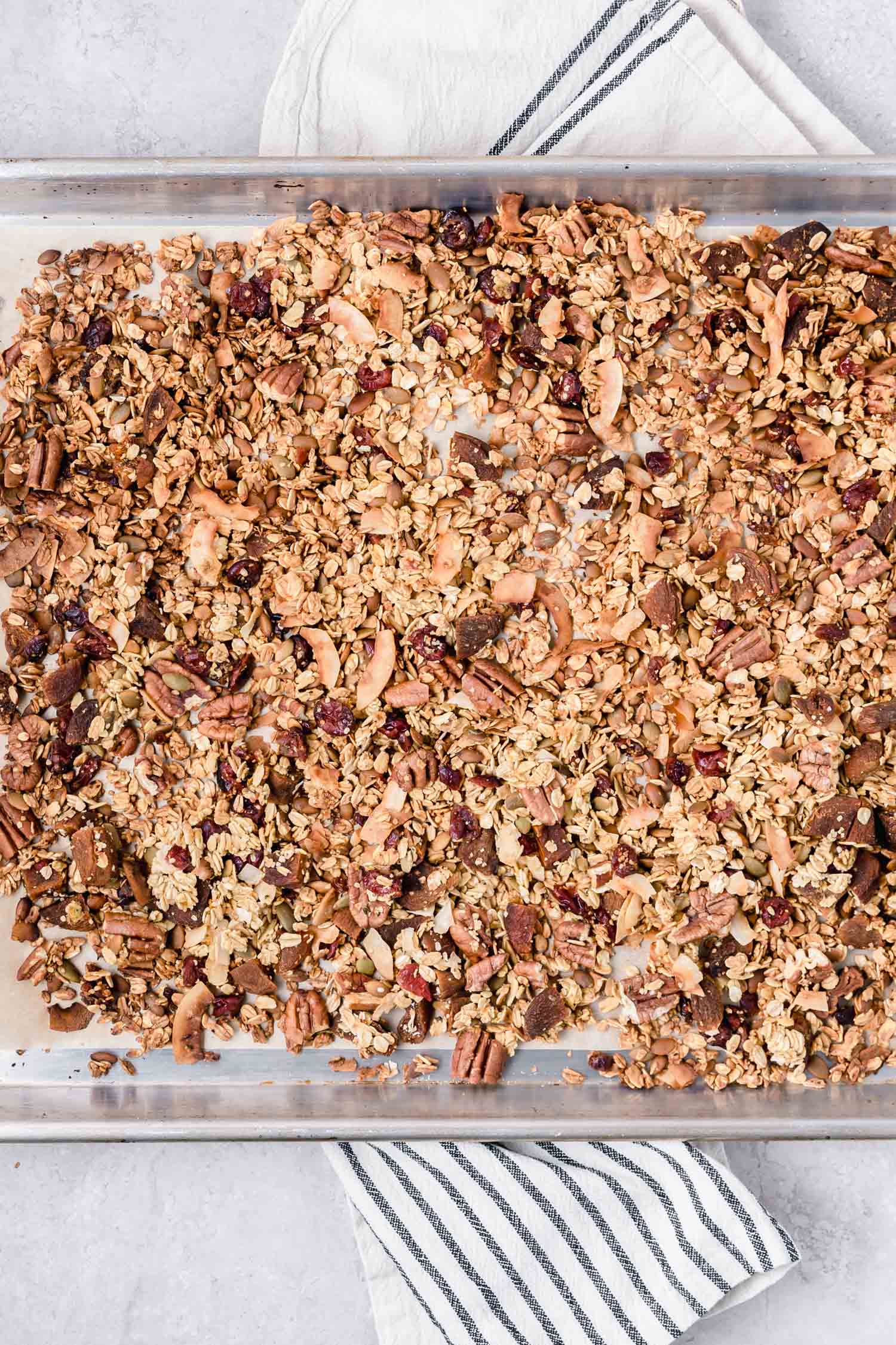Easy Orange Pecan Power Granola is an easy recipe to make and loaded with goodies. #vegangranola #orangepecan #pecangranola #homemadegranola #recipe #veganrecipe #breakfastrecipe #plantbased